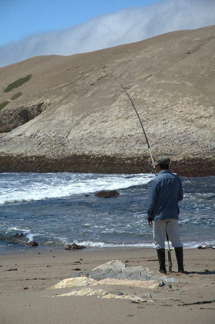 A fisherman on the beach